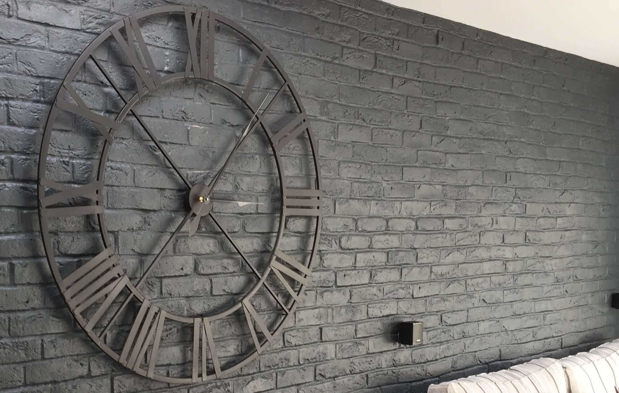 Interior brick wall painted with Monstercolors™ Masonry Paint in grey – durable finish for indoor or outdoor surfaces