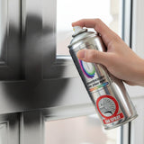 Person using a spray paint can to touch up a pvc window.