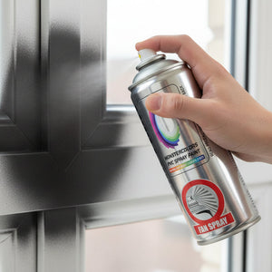 Person using a spray paint can to touch up a pvc window.